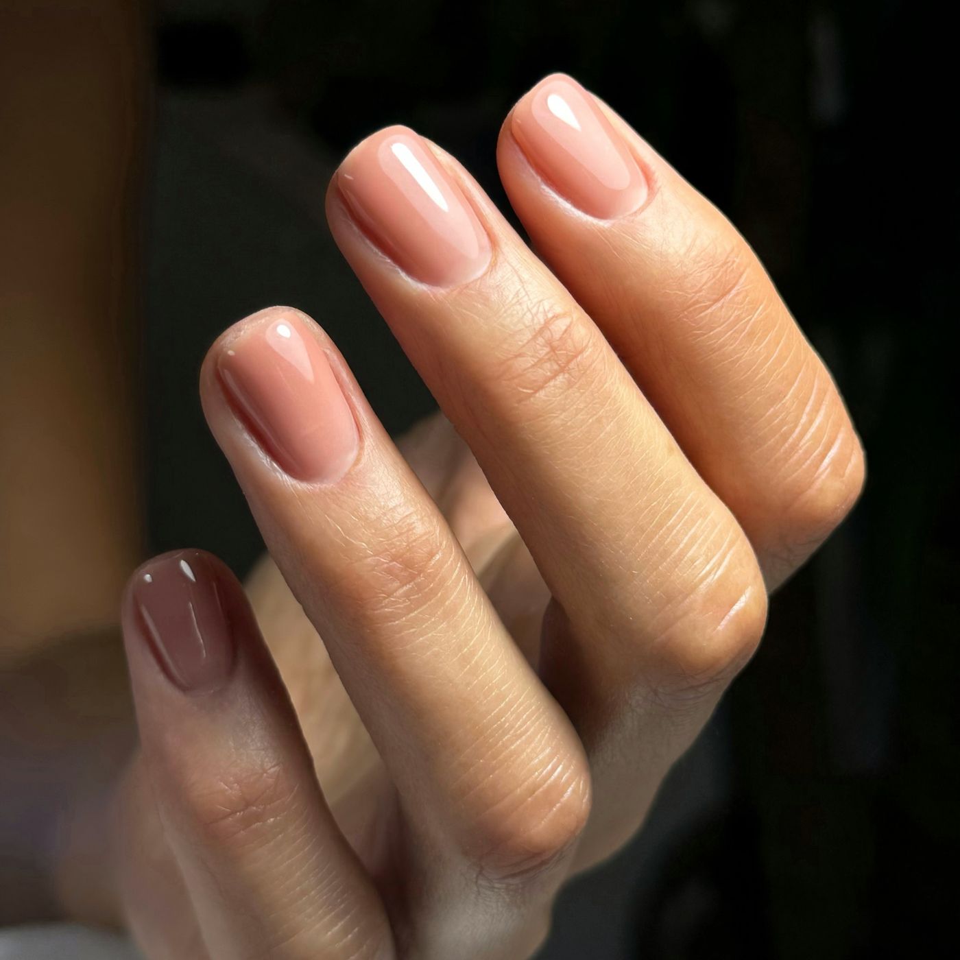 Hands with sheer, natural-looking nude nails